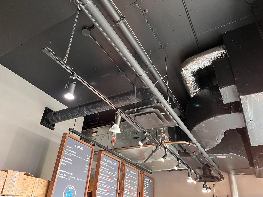 Clean ceiling, light fixtures, and ventilation of downtown bar